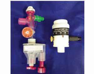 Hình 1-1 Ví dụ về thiết bị hồi sức tự động, Vortran (trái) và Oxylator (phải).